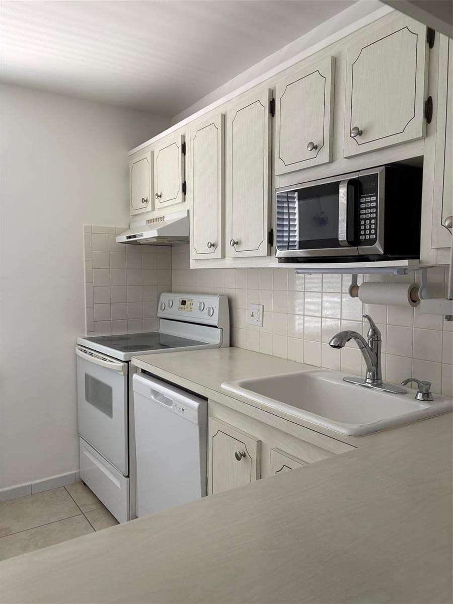1055 Country Club Drive # 404, Margate, FL 33063 photo 2