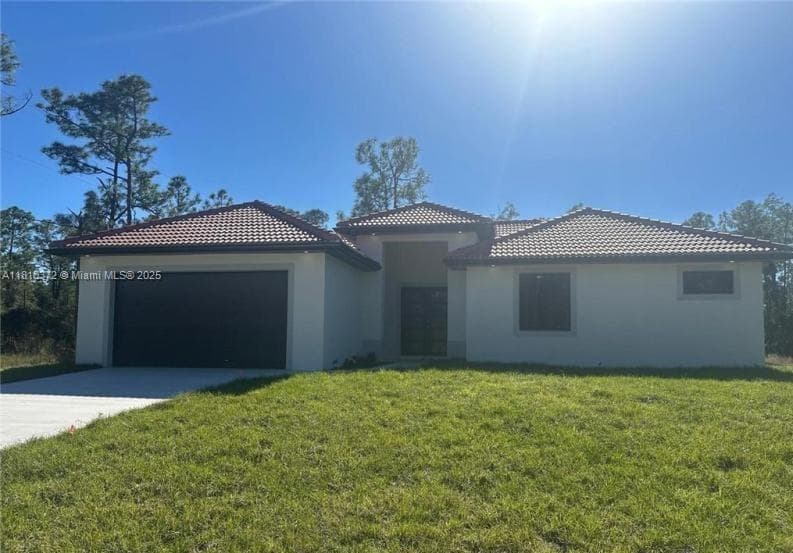 2002 E 13th St, Lehigh Acres, FL 33972