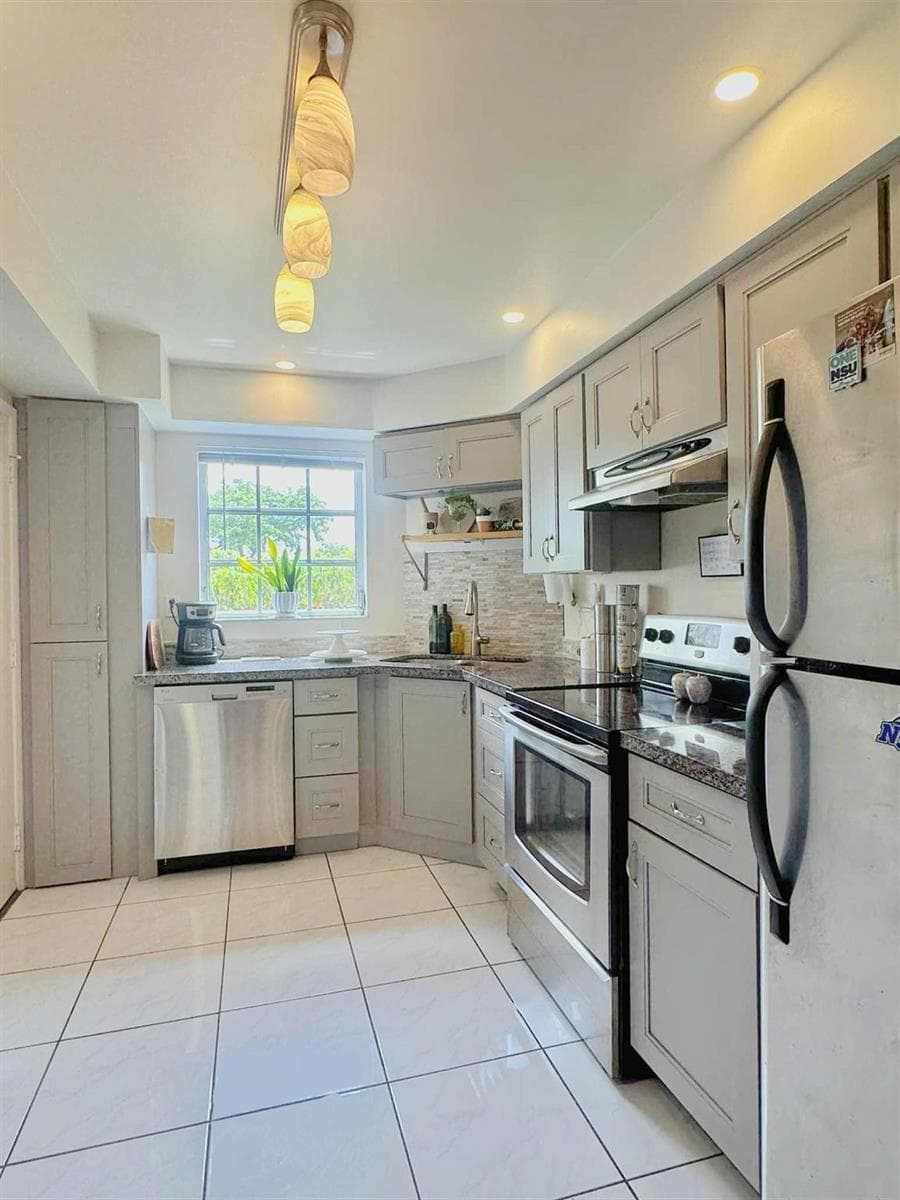 3475 Broken Woods Drive # 101, Coral Springs, FL 33065 photo 2