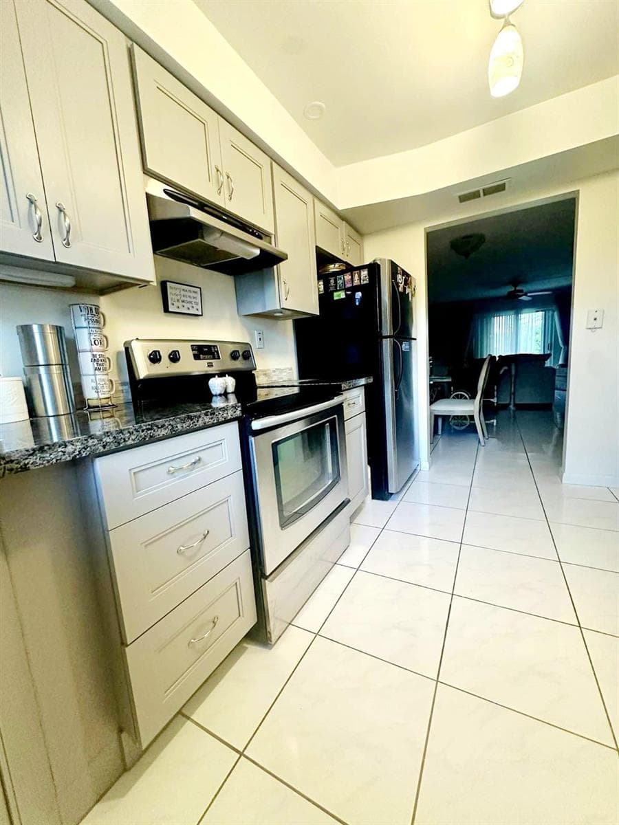3475 Broken Woods Drive # 101, Coral Springs, FL 33065 photo 4