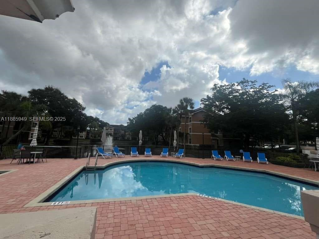 8821 Wiles Rd # 102, Coral Springs, FL 33067 photo 2