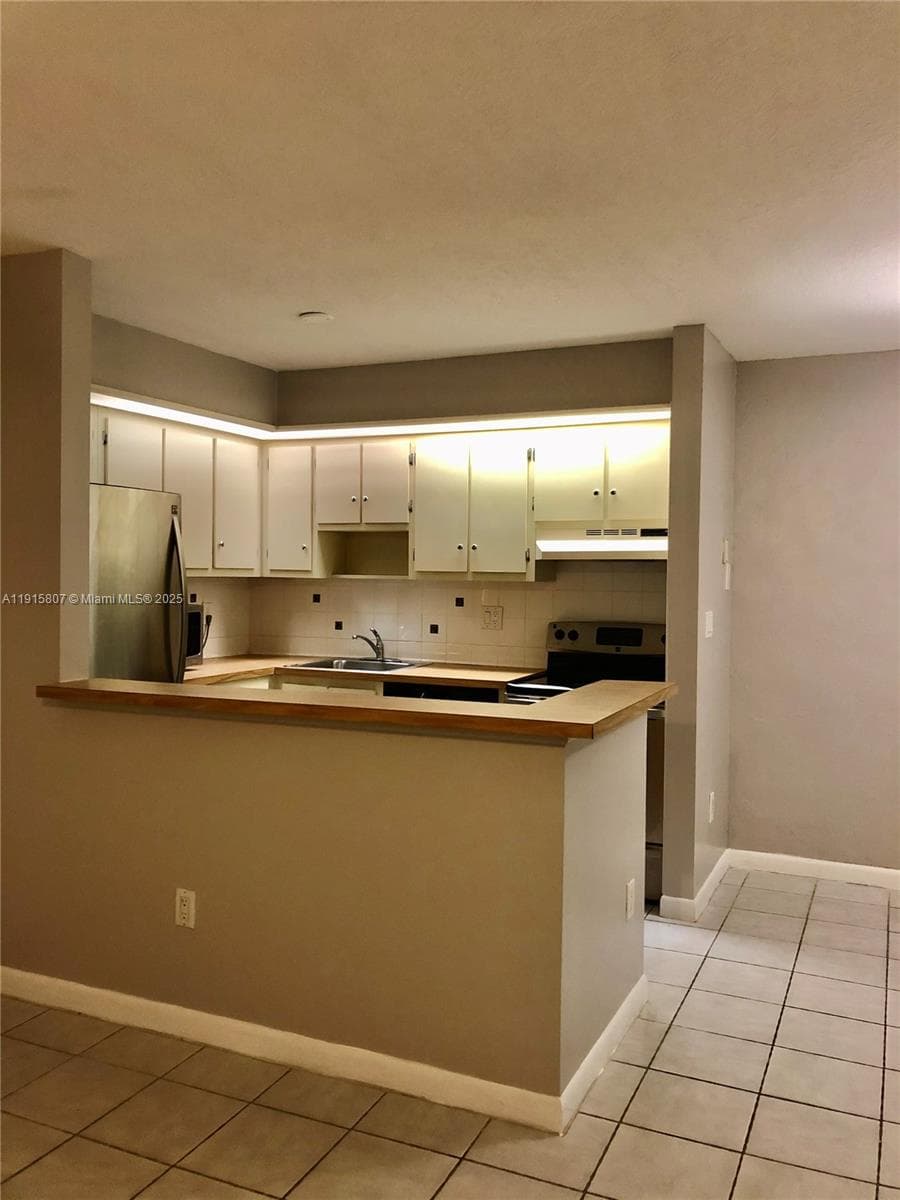 9753 W Mcnab Rd # 112, Tamarac, FL 33321 photo 4