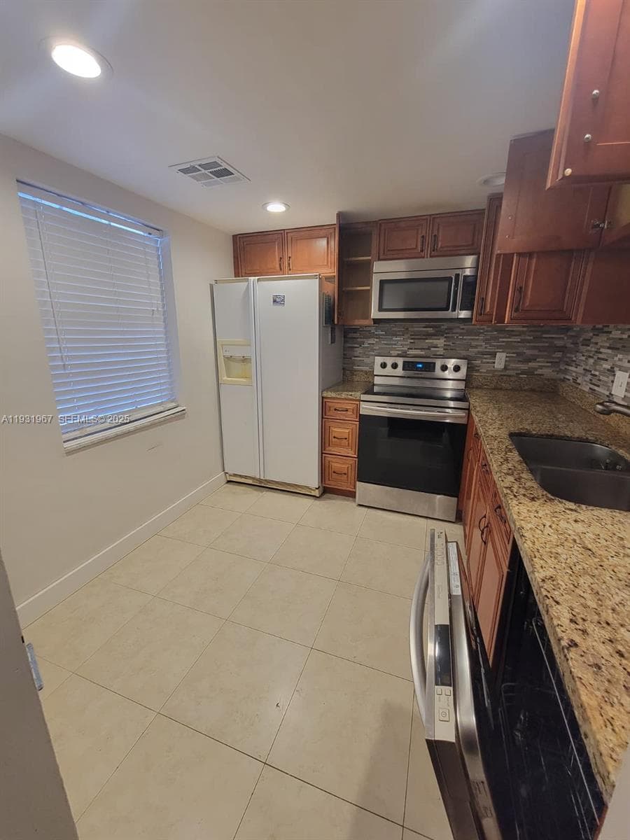 4321 NW 9th Ave # 102, Deerfield Beach, FL 33064 photo 2