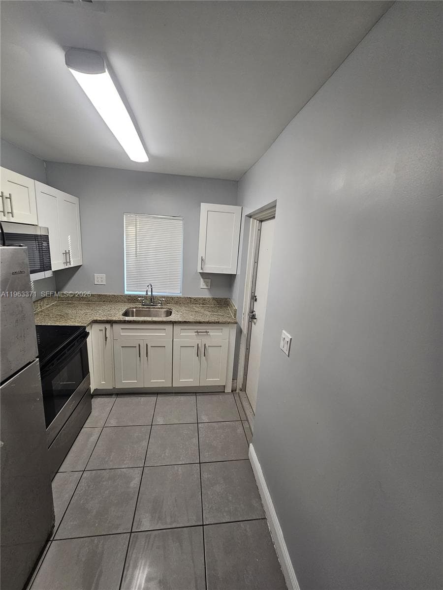 1128 NW 101st St, Miami, FL 33150 photo 4