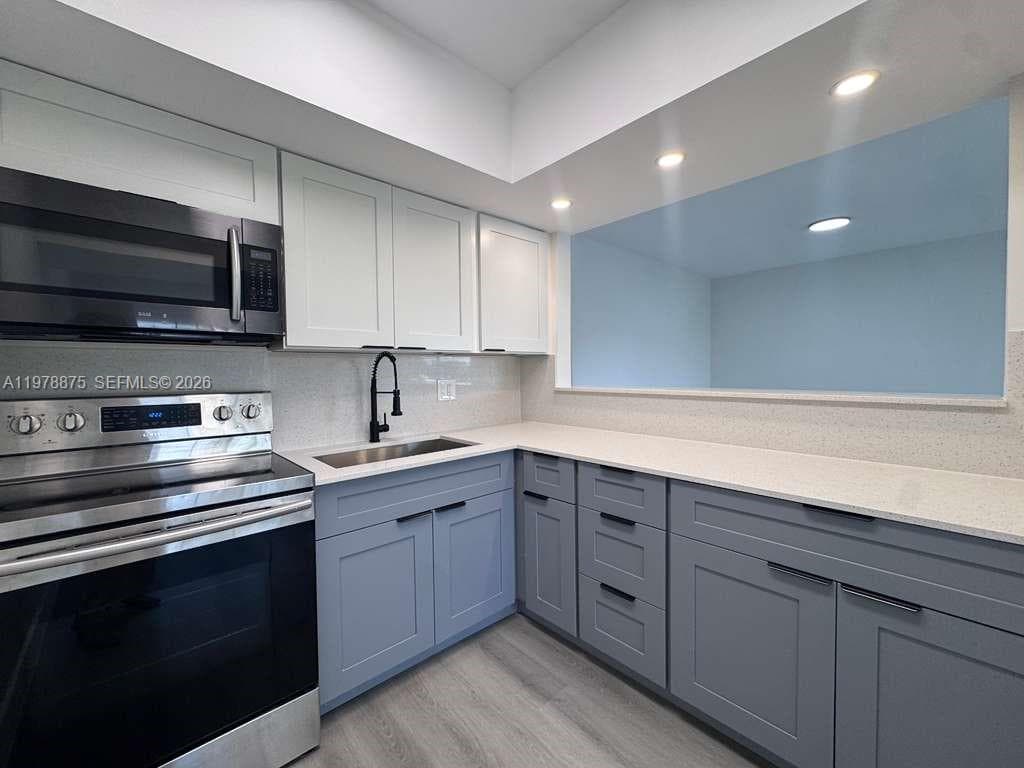 455 Golden Isles Dr # 203, Hallandale Beach, FL 33009 photo 2