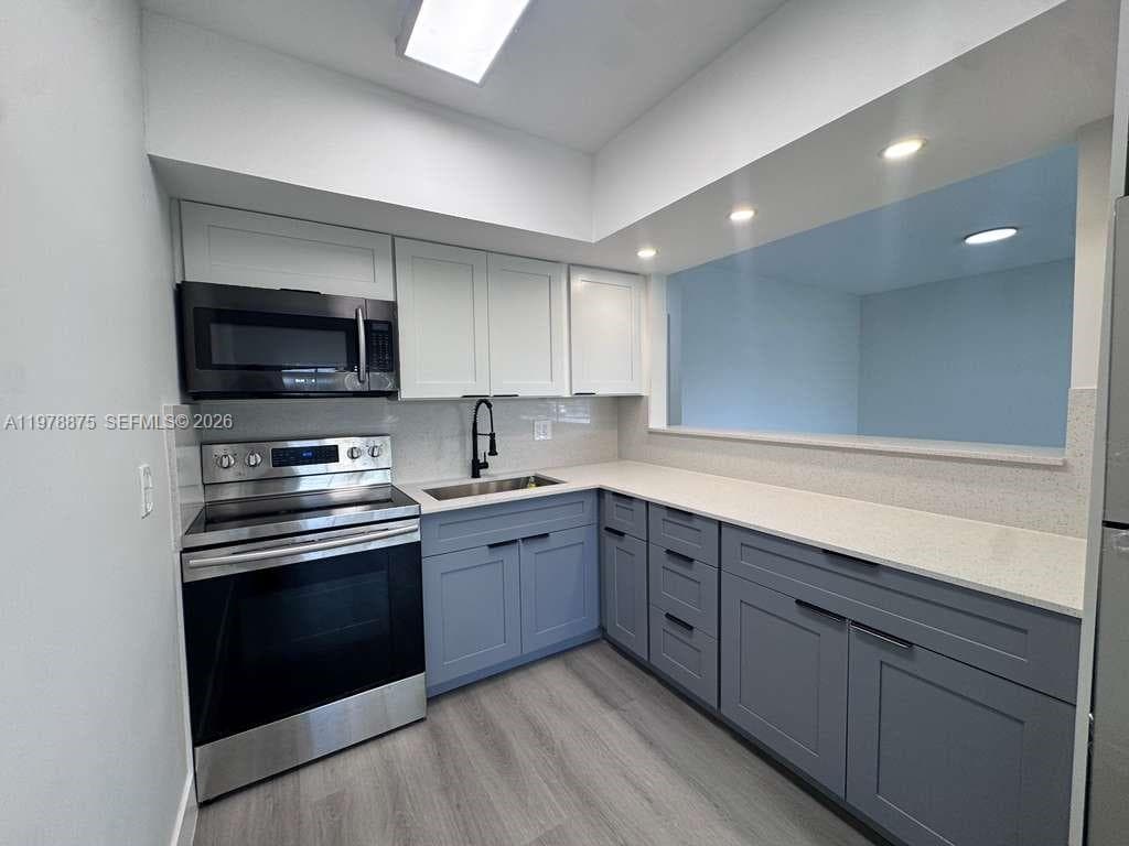 455 Golden Isles Dr # 203, Hallandale Beach, FL 33009 photo 4