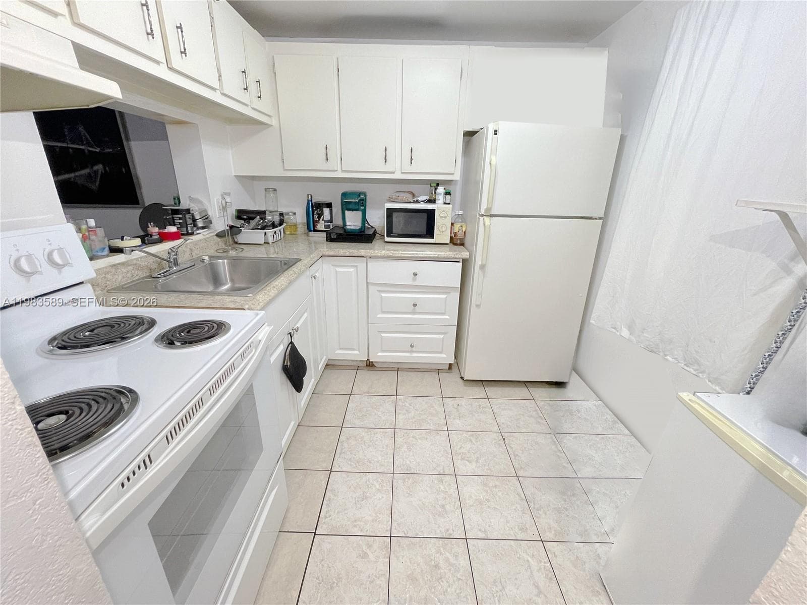 2800 NW 56th Ave # E103, Lauderhill, FL 33313 photo 2