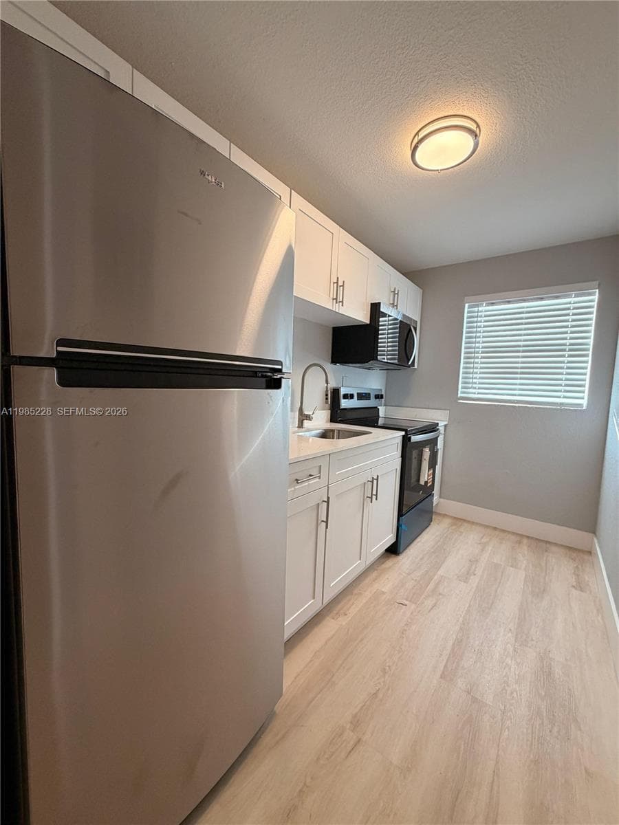 1258 NW 61st St # 04, Miami, FL 33142 photo 2