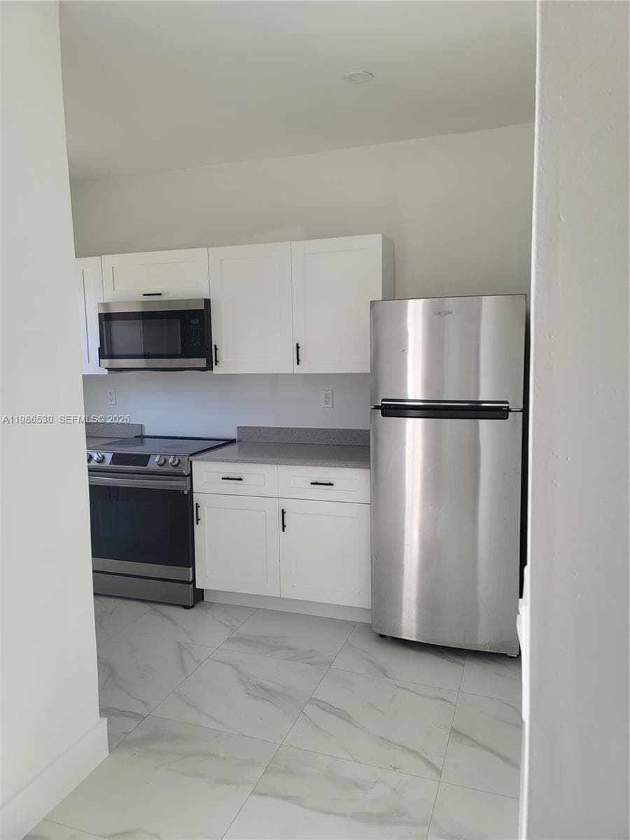1975 NW 24th Ct, Miami, FL 33125 photo 4
