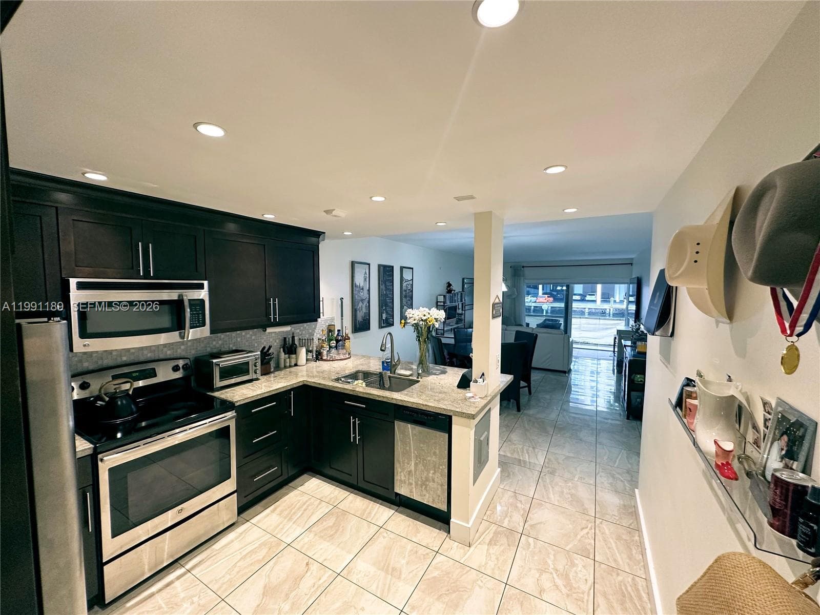 450 Paradise Isle Blvd # 102, Hallandale Beach, FL 33009 photo 2