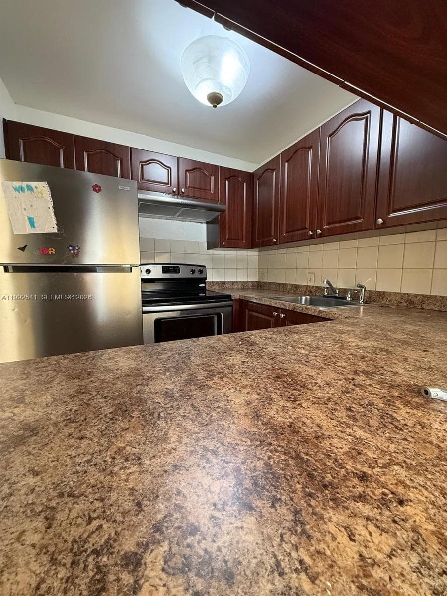 4848 NW 24th Ct # 309, Lauderdale Lakes, FL 33313 photo 2
