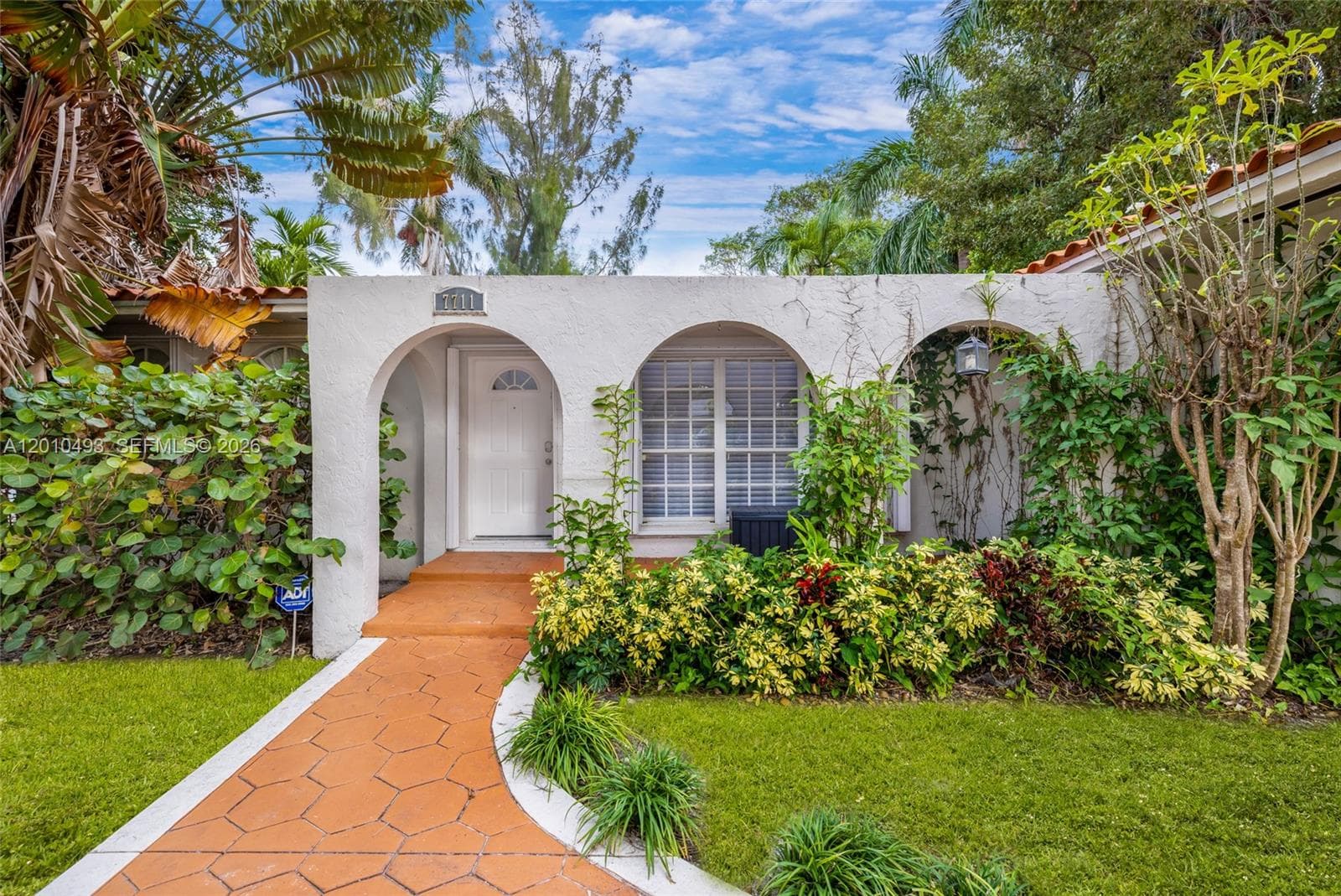 7711 Coquina Dr, North Bay Village, FL 33141 photo 2