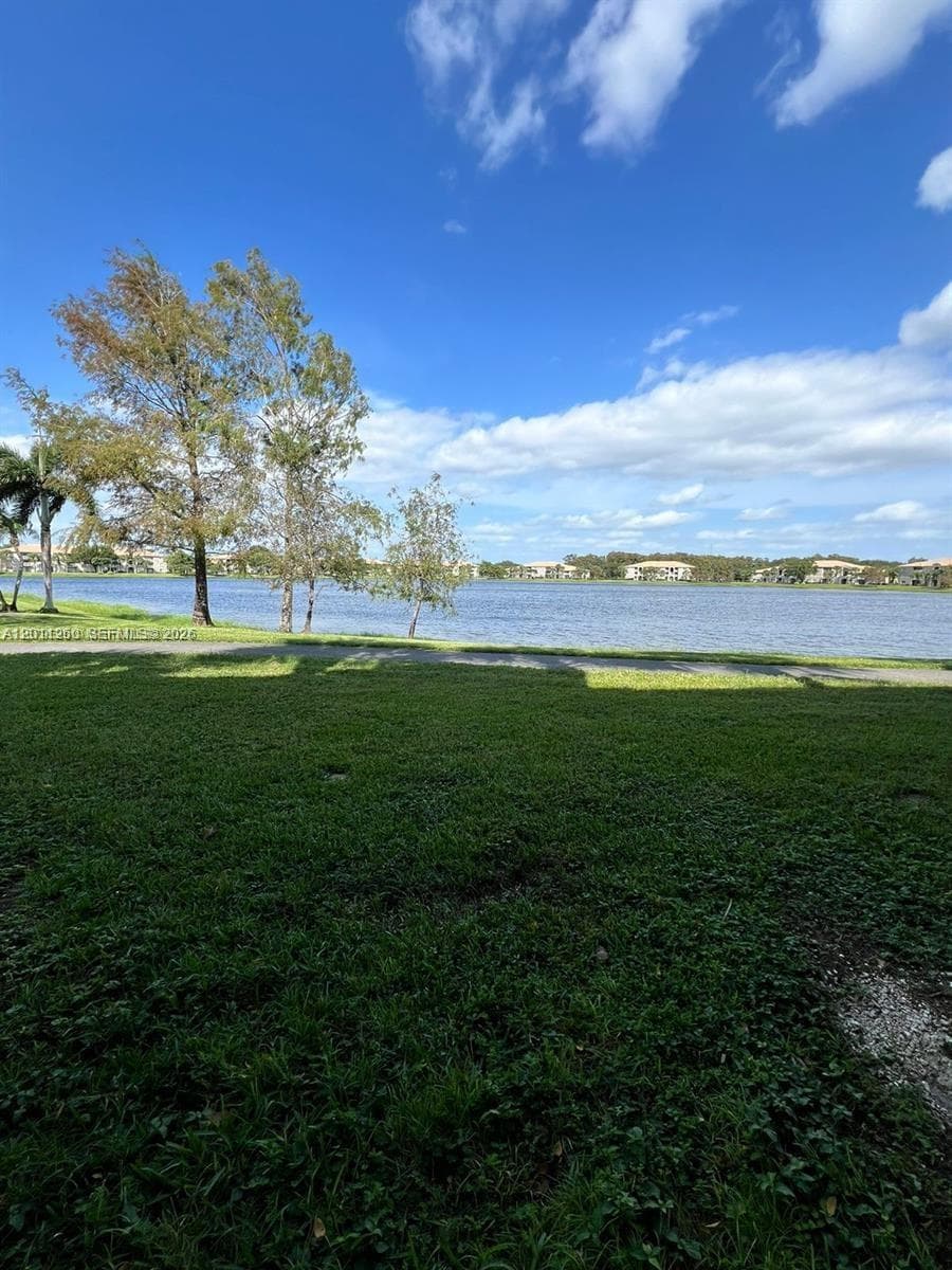 5065 Wiles Rd # 103, Coconut Creek, FL 33073 photo 2