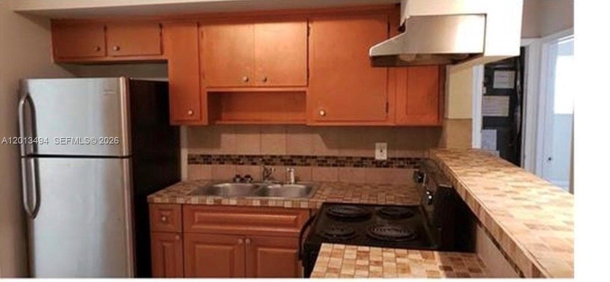 5631 SW 27th St, West Park, FL 33023 photo 3
