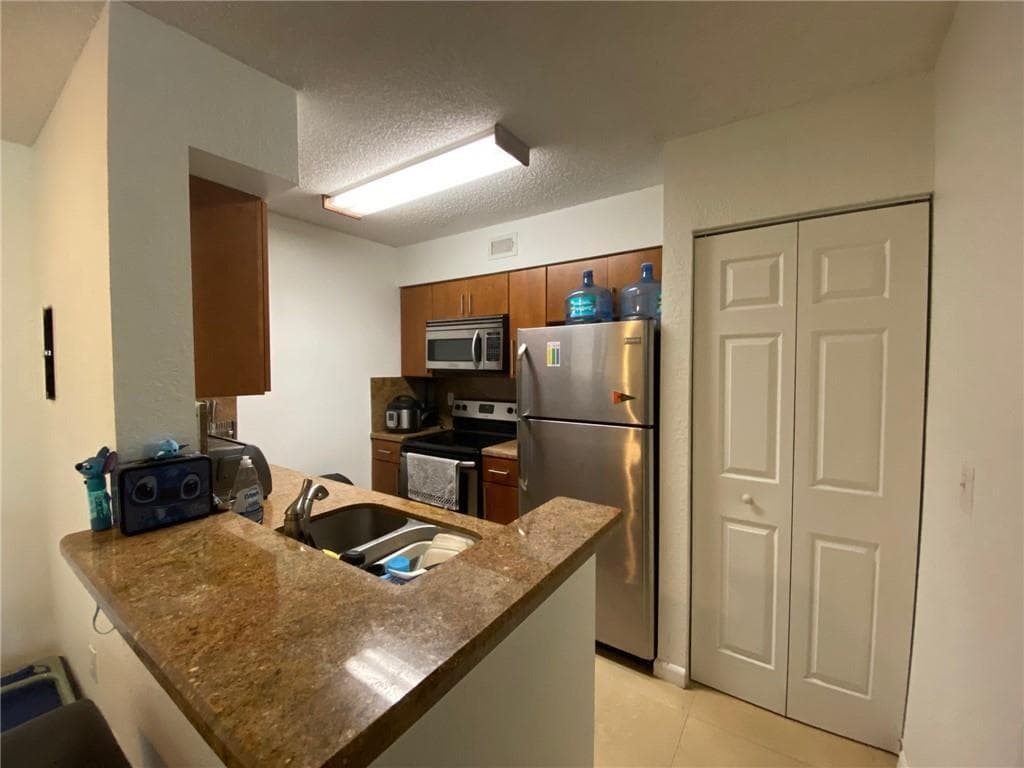 2841 N Oakland Forest Drive # 107, Oakland Park, FL 33309 photo 2