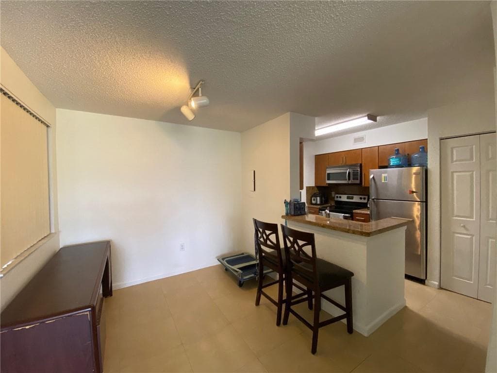 2841 N Oakland Forest Drive # 107, Oakland Park, FL 33309 photo 3
