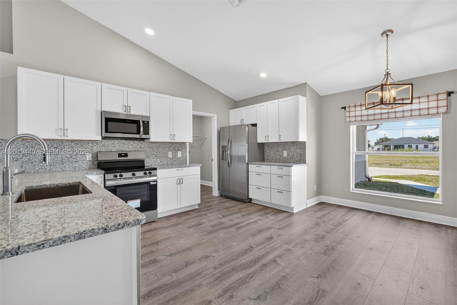 409 NE 25th Ter, Cape Coral, FL 33909 photo 2