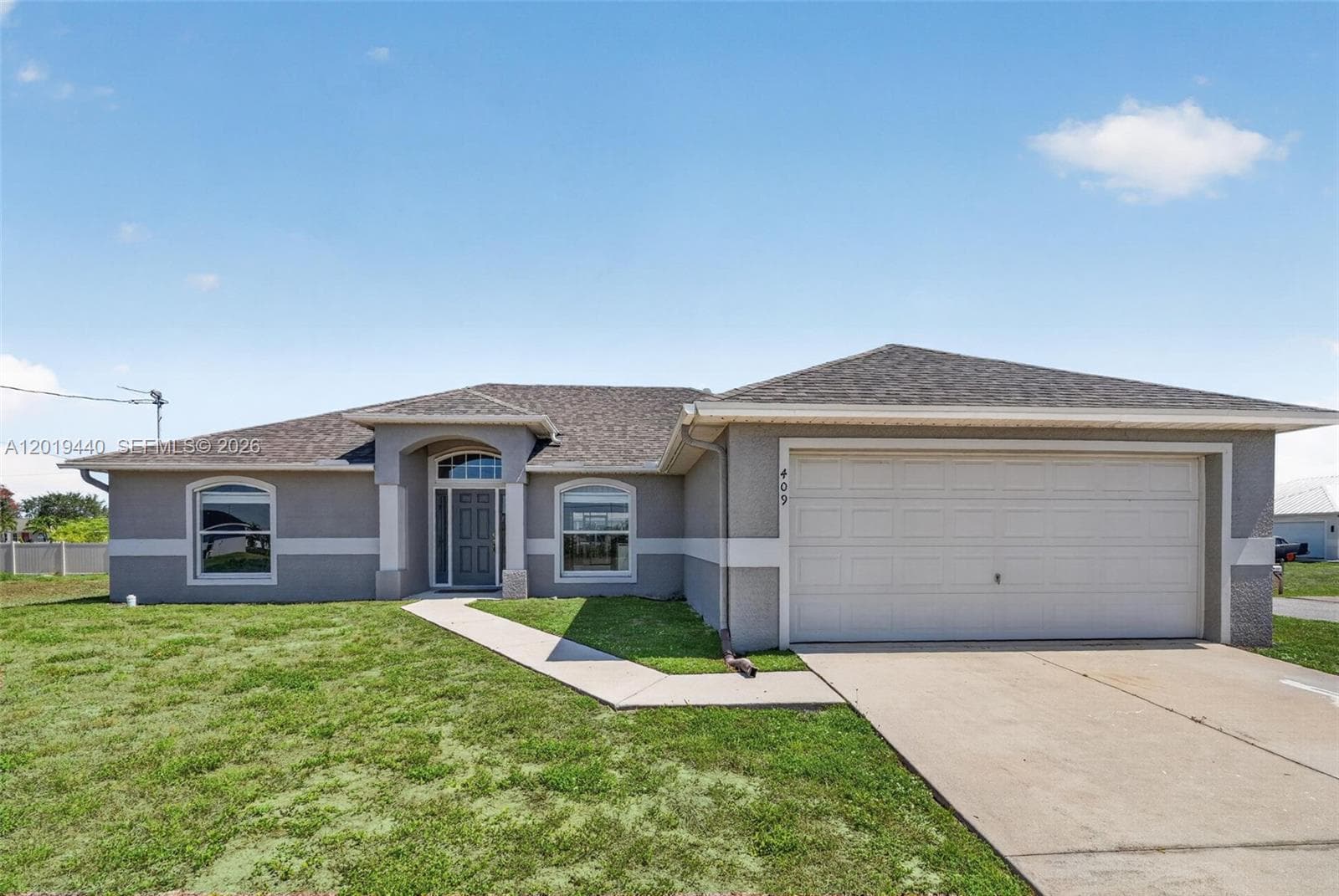 409 NE 25th Ter, Cape Coral, FL 33909 photo 4