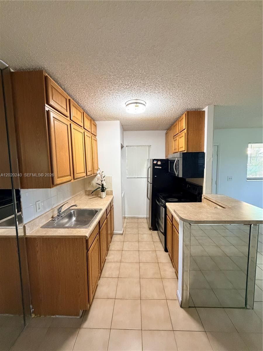 588 Trace Cir # 202, Deerfield Beach, FL 33441 photo 3