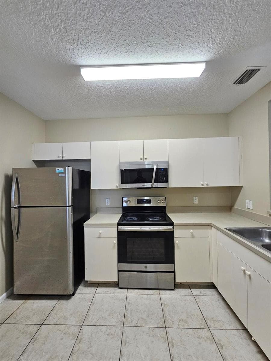 1063 Golden Lakes Boulevard # 322, West Palm Beach, FL 33411 photo 4