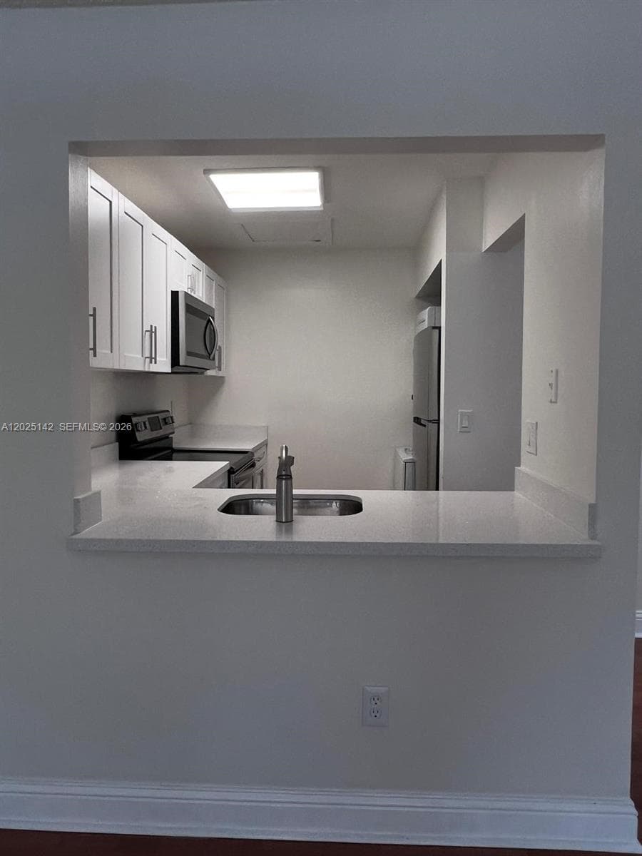 2570 W 67th Pl # 21-2, Hialeah, FL 33016 photo 3