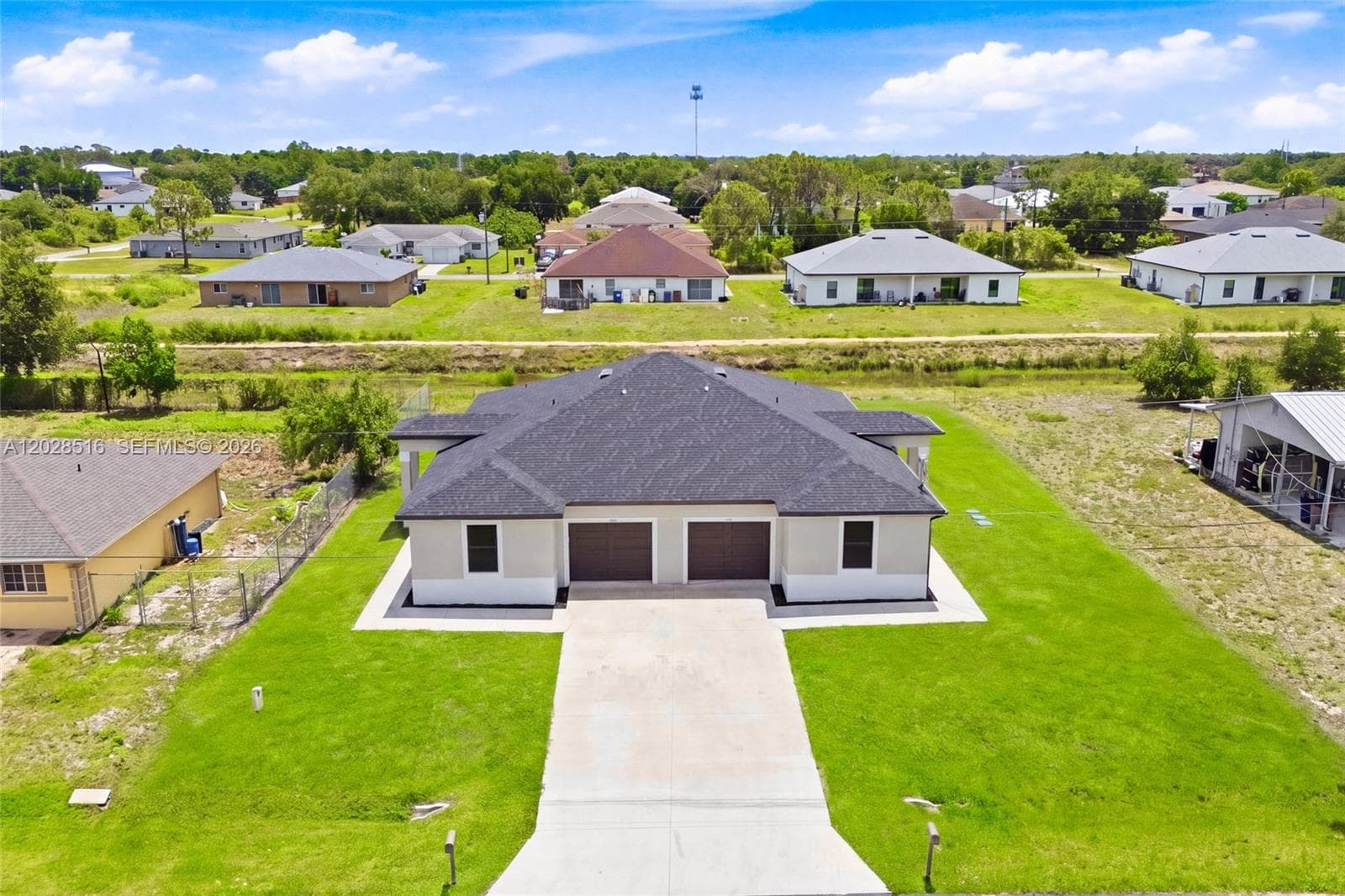 225/227 Hightower AVE S, Lehigh Acres, FL 33973 photo 3