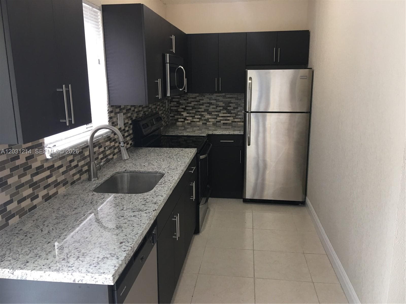 1594 NE 155th Ter, North Miami Beach, FL 33162 photo 3