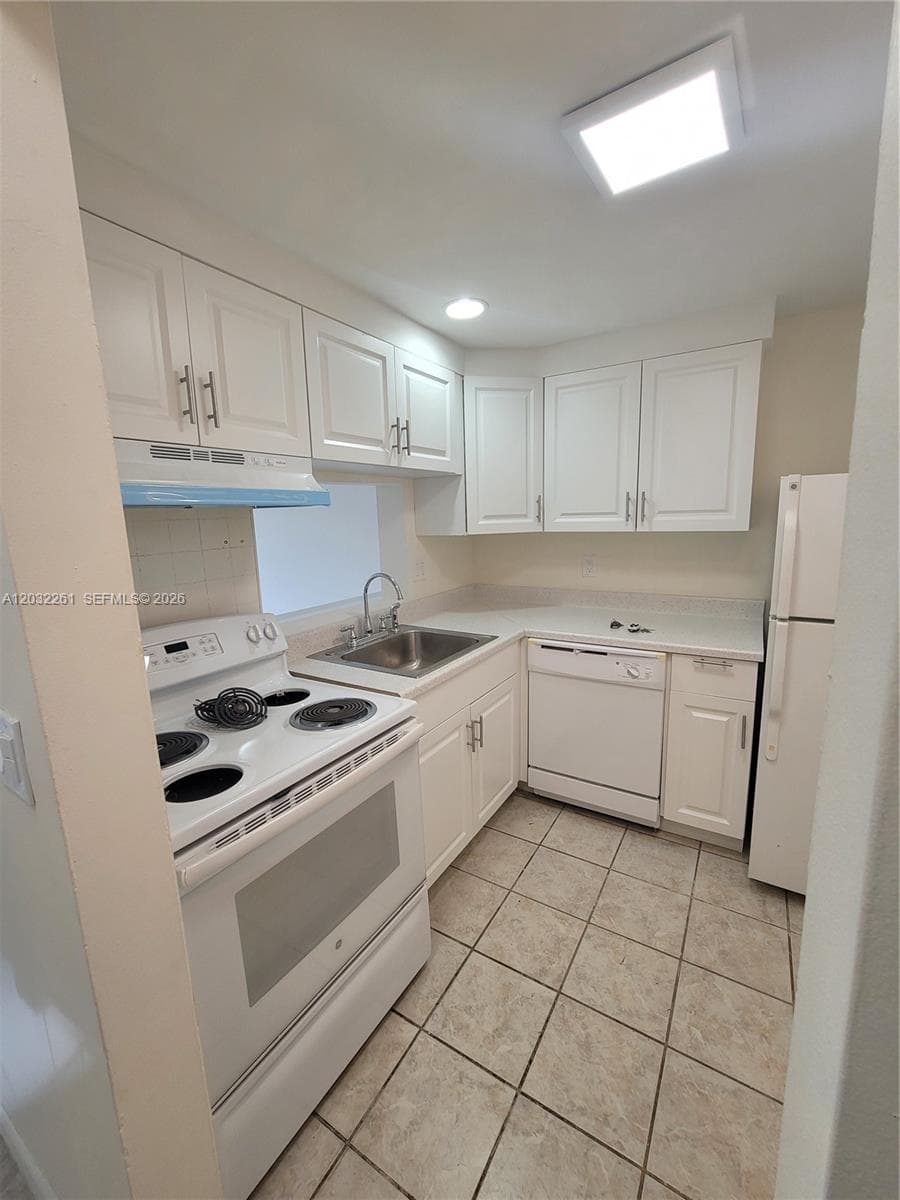 2800 NW 56th Ave # E401, Lauderhill, FL 33313 photo 3