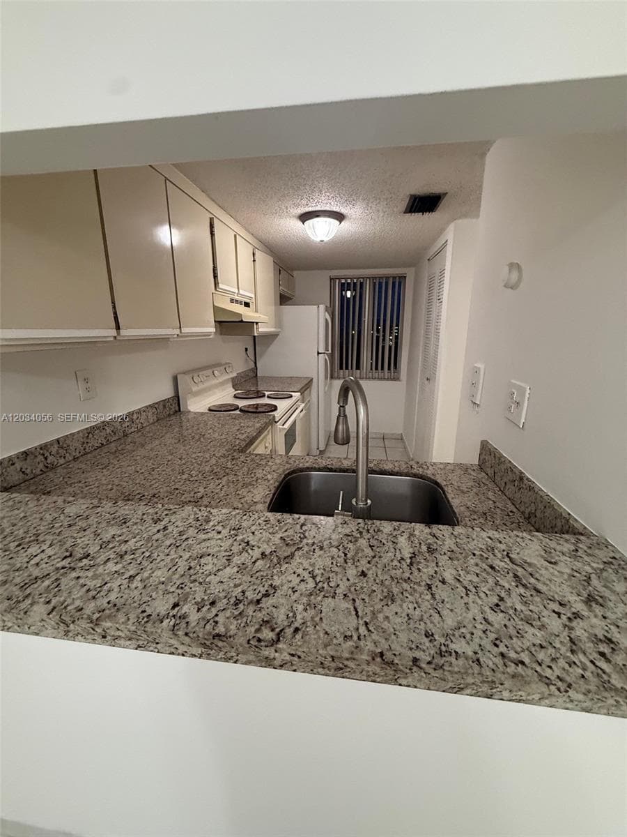 9917 W Okeechobee Rd # 3-510, Hialeah Gardens, FL 33016 photo 2