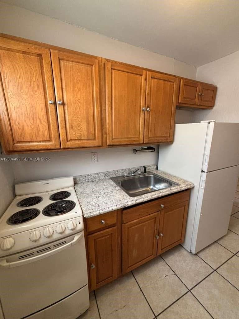 14120 NW 24th Ct # 204, Opa-Locka, FL 33054 photo 2