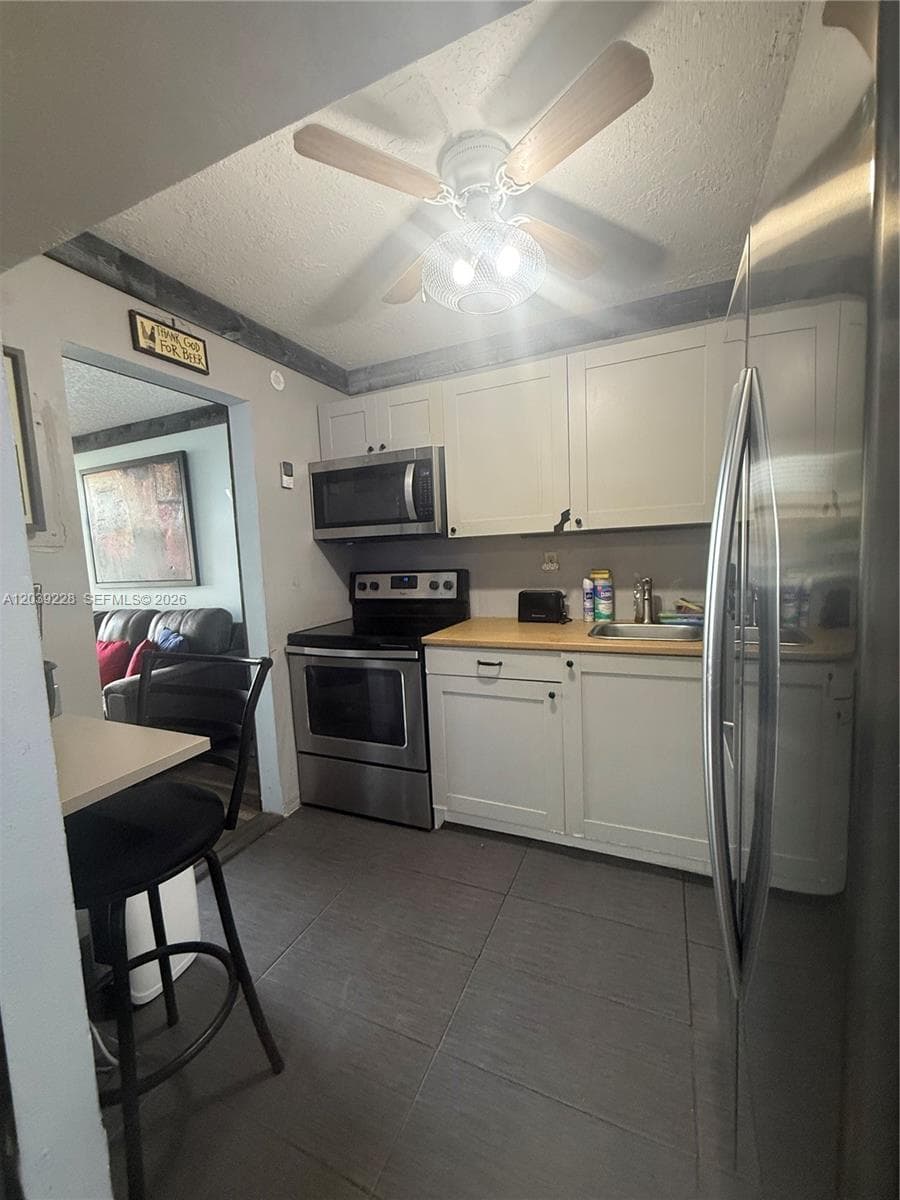 9081 Sunrise Lakes Blvd # 108, Sunrise, FL 33322 photo 4