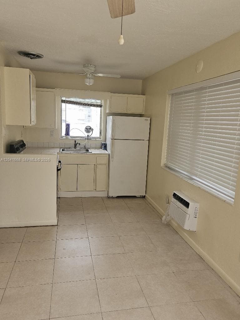 2405-2411 NE 136th Ln, North Miami Beach, FL 33181 photo 4