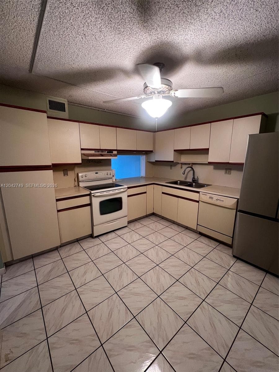 4975 E Sabal Palm Blvd # 304, Tamarac, FL 33319 photo 5