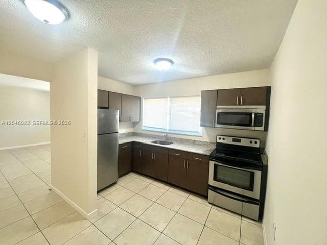 7626 NE 6th Ct # 5, Miami, FL 33138 photo 3