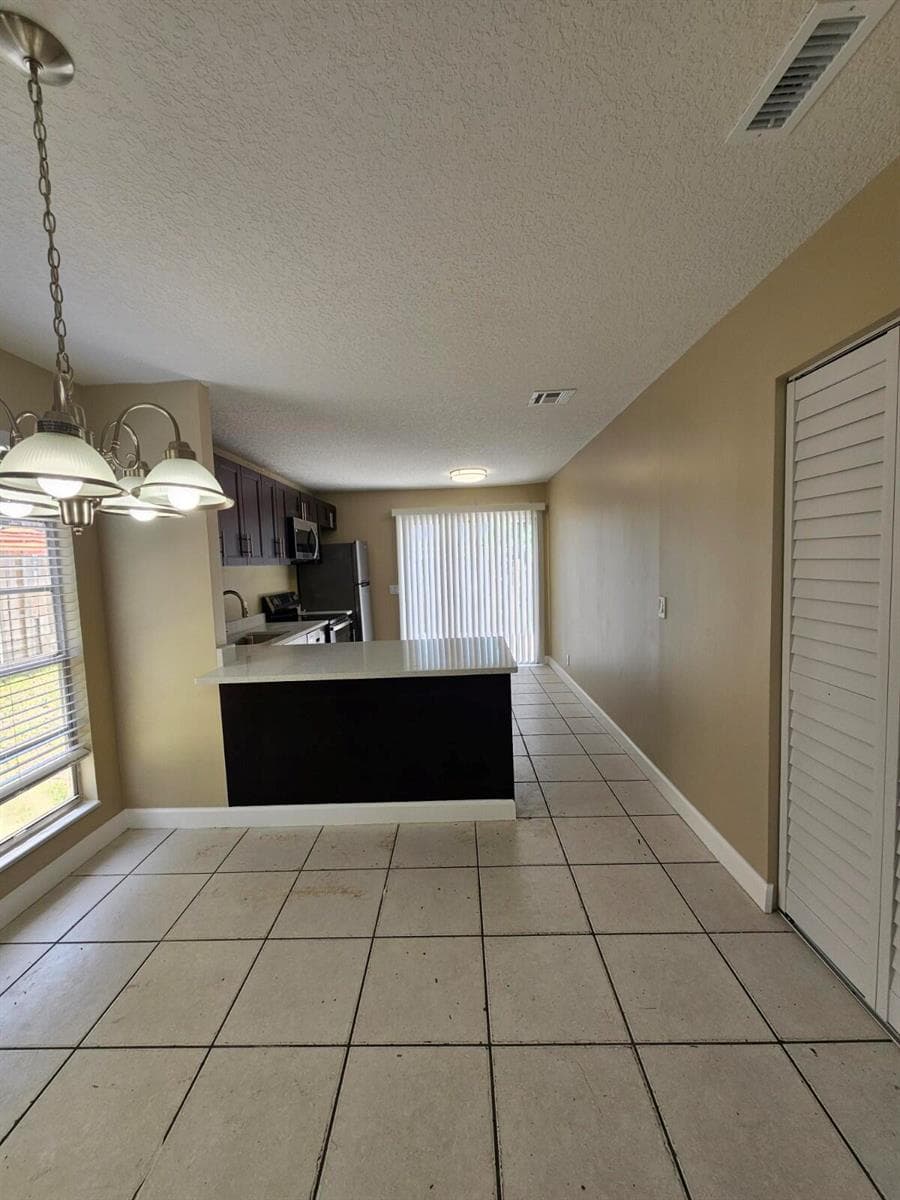 4876 Orleans Court # A, Haverhill, FL 33415 photo 4