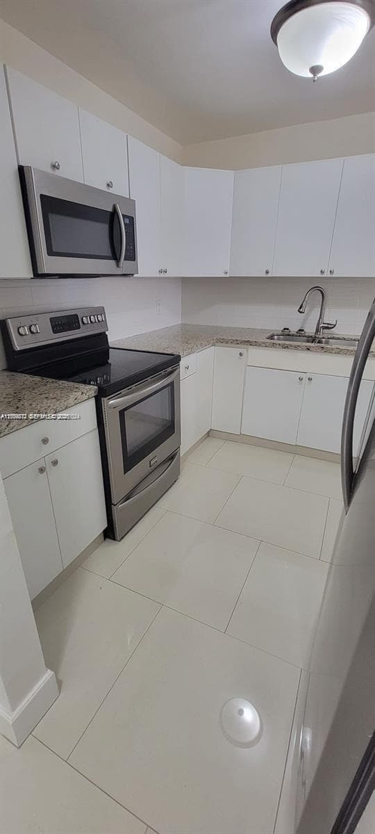 6970 NW 186th St # 3-502, Hialeah, FL 33015 photo 2