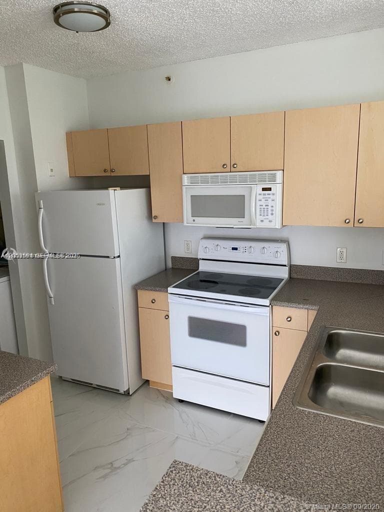 7980 N Nob Hill Rd # 102, Tamarac, FL 33321 photo 3