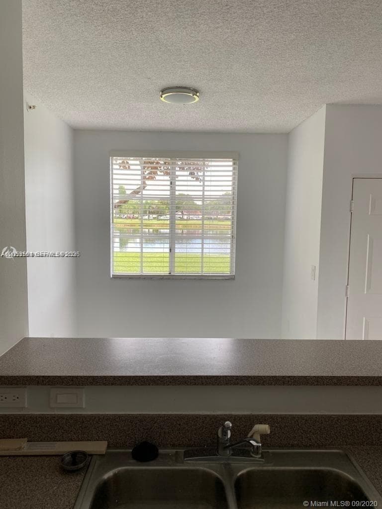 7980 N Nob Hill Rd # 102, Tamarac, FL 33321 photo 5