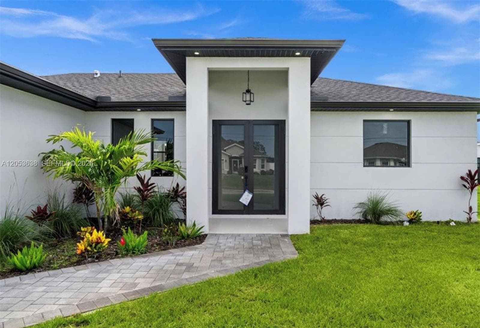 409 NW 25th PL, Cape Coral, FL 33993 photo 2