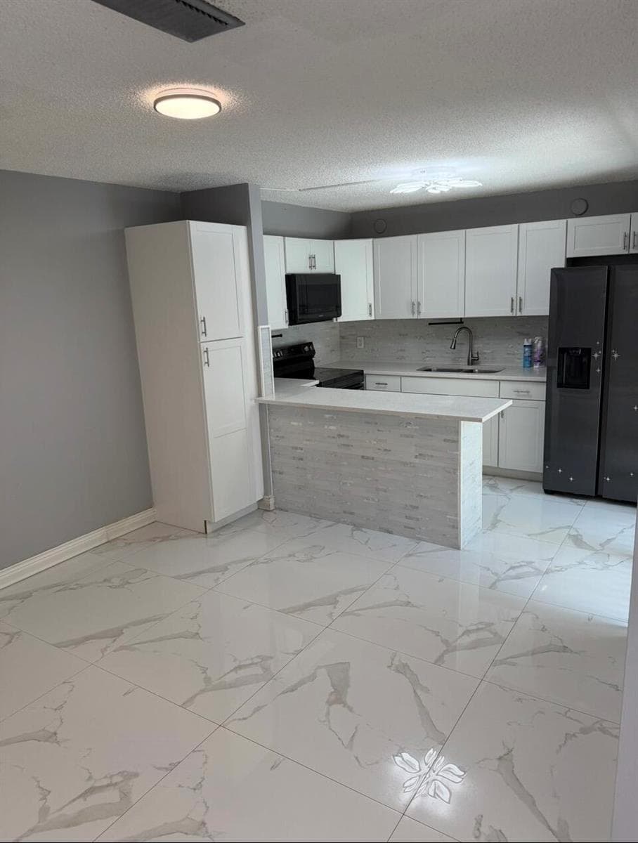 232 WOODLAND Road, Palm Springs, FL 33461 photo 3