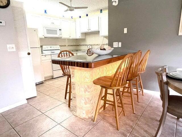 5839 La Pinata Boulevard # C-1, FL 33463 photo 5