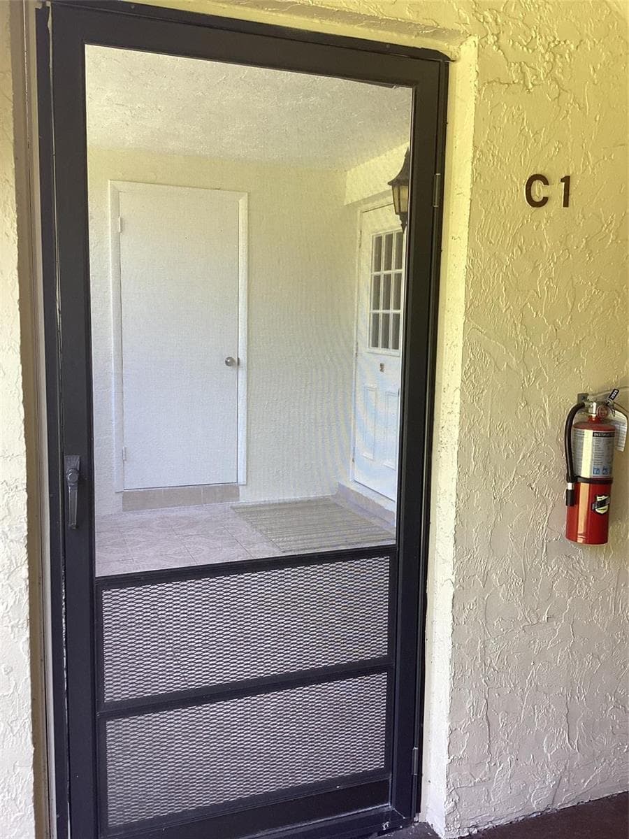 5927 LA PINATA Boulevard # C-1, FL 33463 photo 2