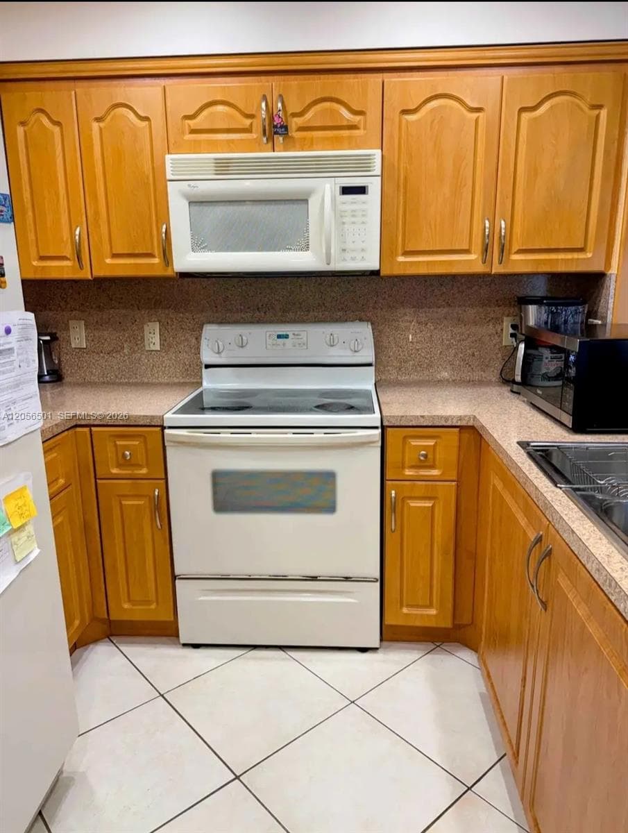 3545 NE 167th St # 408, North Miami Beach, FL 33160 photo 3