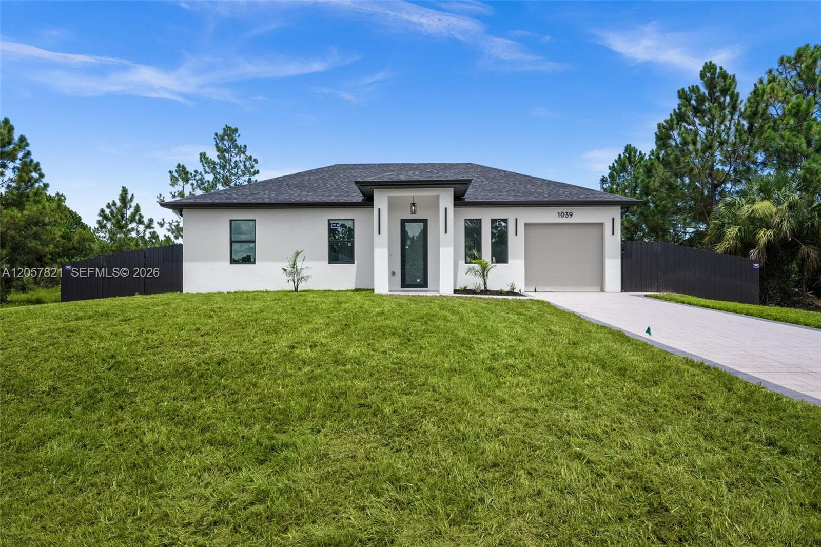 1039 Bassinger Ave S, Lehigh Acres, FL 33974 photo 5