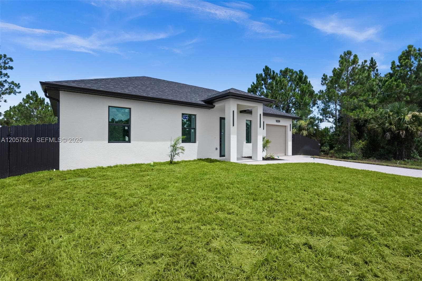 1039 Bassinger Ave S, Lehigh Acres, FL 33974 photo 4