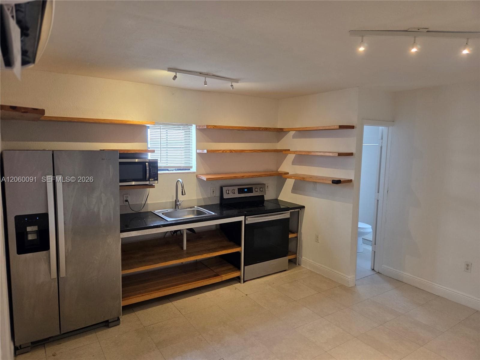 225 NW 59th St # B, Miami, FL 33127 photo 5