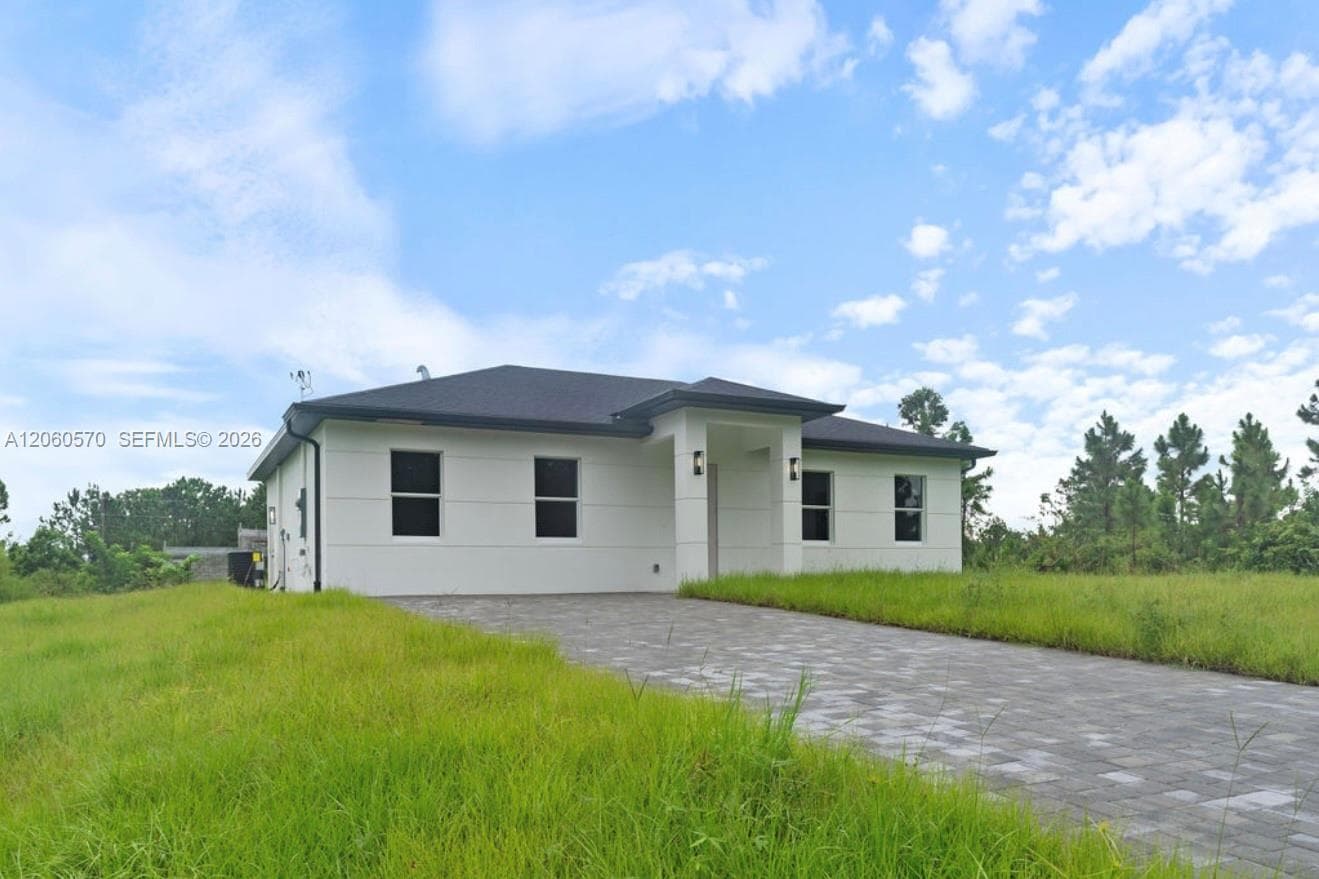 708 PEACOCK AVE, Lehigh Acres, FL 33974 photo 2