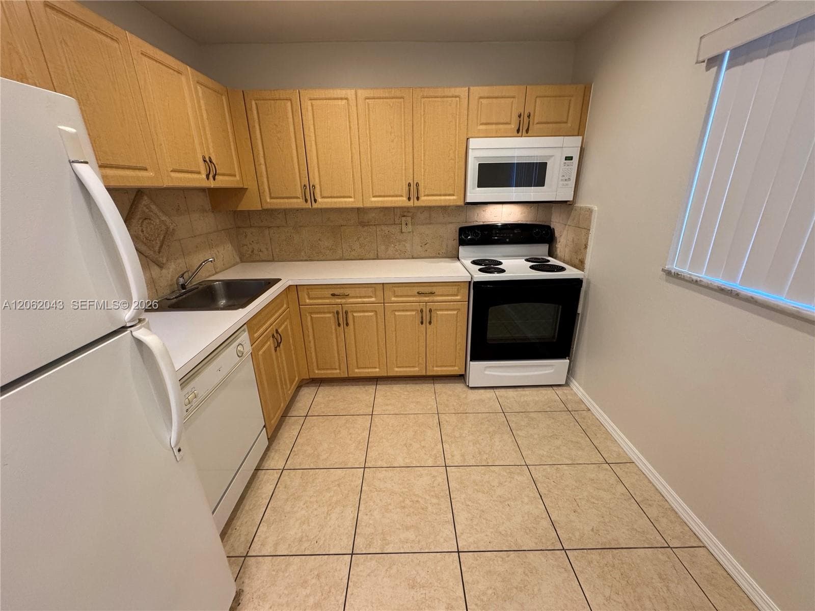 7700 Camino Real # D-407, Miami, FL 33143