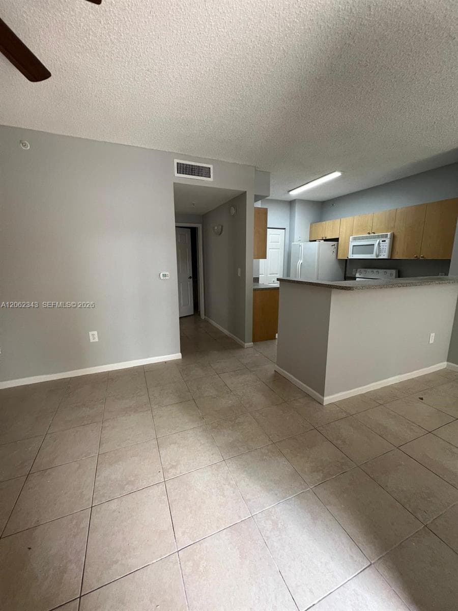 8020 N Nob Hill Rd # 102, Tamarac, FL 33321 photo 2