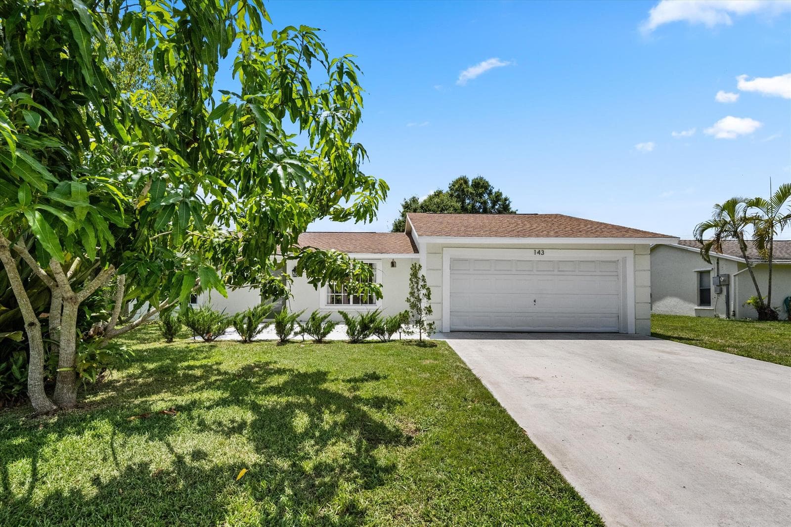 143 Bobwhite Road, Royal Palm Beach, FL 33411